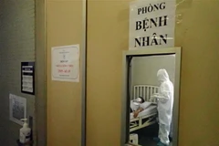 Bệnh nhân nghi nhiễm virus corona được cách ly, điều trị. (Ảnh: Đinh Hằng/TTXVN)