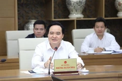 Bộ trưởng Bộ Giáo dục và Đào tạo Phùng Xuân Nhạ phát biểu tại buổi làm việc. (Ảnh: Văn Điệp/TTXVN)