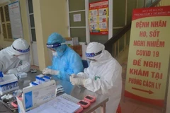 Xét nghiệm nhanh virus SARS-CoV-2. (Ảnh: TTXVN)