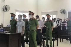 Các bị cáo tại phiên tòa. (Ảnh: TTXVN)