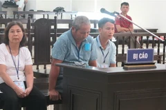 Các bị cáo tại phiên xét xử. (Ảnh: Doãn Tấn/TTXVN)