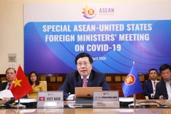 Phó Thủ tướng, Bộ trưởng Bộ Ngoại giao Phạm Bình Minh phát biểu tại Hội nghị trực tuyến đặc biệt cấp Bộ trưởng Ngoại giao ASEAN-Hoa Kỳ về ứng phó dịch bệnh COVID-19. (Ảnh: Lâm Khánh/TTXVN)