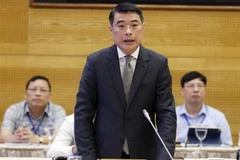 Thống đốc Ngân hàng Nhà nước Lê Minh Hưng phát biểu. (Ảnh: Thống Nhất/TTXVN)