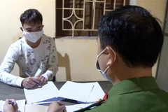 Đối tượng Đoàn Quốc Được (xã Hoàng Nam, huyện Nghĩa Hưng, tỉnh Nam Định) tại cơ quan Công an. (Ảnh: TTXVN)