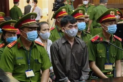 Các bị cáo tại phiên xét xử. (Ảnh: Thành Chung/TTXVN)