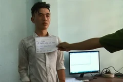 Đối tượng Lê Tuấn Anh tại cơ quan công an. (Ảnh: Nguyễn Văn Việt/TTXVN)