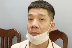 Đối tượng Phạm Anh Tuấn. (Ảnh: TTXVN)