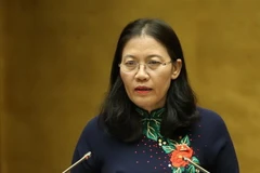 Chủ nhiệm Ủy ban Tư pháp của Quốc hội Lê Thị Nga trình bày Báo cáo giải trình, tiếp thu, chỉnh lý dự án Luật Hòa giải, đối thoại tại tòa án. (Ảnh: Dương Giang/TTXVN)