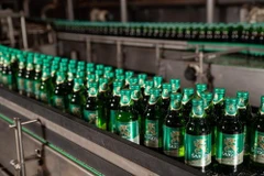 Dây chuyền sản xuất bia của Sabeco. (Ảnh: PV/Vietnam+)