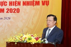 Bộ trưởng Bộ Tài chính Đinh Tiến Dũng phát biểu. (Ảnh: Phạm Hậu/TTXVN)