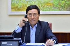 Phó Thủ tướng, Bộ trưởng Bộ Ngoại giao Phạm Bình Minh điện đàm với Bộ trưởng Ngoại giao Nhật Bản Motegi Toshimitsu về hợp tác ứng phó với dịch bệnh COVID-19. (Ảnh: TTXVN)