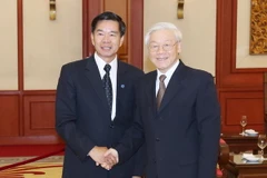 Tổng Bí thư Nguyễn Phú Trọng tiếp Đô trưởng Thủ đô Vientiane Sinlavong Khoutphaythoune. (Ảnh: Lâm Khánh/TTXVN)
