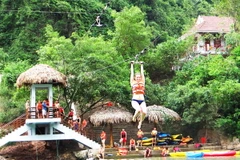 [Photo] Quảng Bình khai trương dịch vụ đu dây trên không đầu tiên