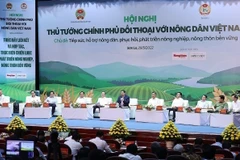 Thủ tướng Chính phủ Phạm Minh Chính đối thoại với nông dân Việt Nam năm 2022. (Ảnh: Dương Giang: TTXVN)