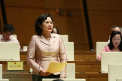 Thống đốc Ngân hàng Nhà nước Nguyễn Thị Hồng giải trình, làm rõ một số vấn đề đại biểu Quốc hội nêu. (Ảnh: An Đăng/TTXVN)