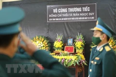 Lễ tang Thiếu tá phi công Trần Ngọc Duy. (Ảnh: Tuấn Anh/TTXVN)