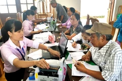 Trong suốt hành trình 20 năm qua, đã có hơn 42 triệu lượt hộ được vay vốn chính sách để vươn lên thoát nghèo, làm giàu chính đáng. (Ảnh: Vietnam+)