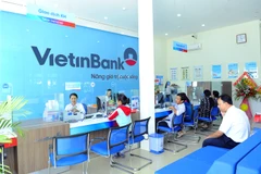 Giao dịch tại VietinBank. (Ảnh: Vietnam+)