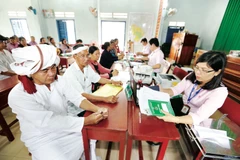 Ngân hàng Chính sách xã hội hiện đang duy trì giao dịch cố định tại 10.435 điểm giao dịch xã, phường, thị trấn trong toàn quốc. (Ảnh: Vietnam+)