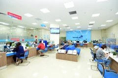 Giao dịch tại VietinBank. (Ảnh: Vietnam+)