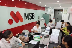 Giao dịch tại MSB. (Ảnh: Vietnam+)