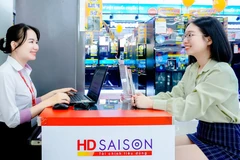 Đã có nhiều công nhân, người lao động được tiếp cận vốn vay ưu đãi tại HD SAIGON. (Ảnh: Vietnam+)