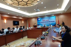 Các đại biểu tham dự tại buổi họp báo. (Ảnh: Vietnam+)