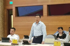 Phó Thống đốc NHNN Phạm Thanh Hà trả lời tại họp báo Chính phủ. (Ảnh: Vietnam+)