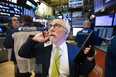 Giao dịch viên tại Sàn giao dịch chứng khoán New York, Mỹ. (Ảnh: THX/TTXVN)