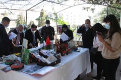 Quang cảnh buổi triển lãm. (Ảnh: TTXVN)