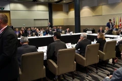 Bộ trưởng Thương mại và Kinh tế của 12 nước thành viên TPP tới tham dự lễ ký kết ở Auckland, New Zealand ngày 3/2. (Nguồn: AFP/TTXVN)