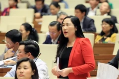Đại biểu Quốc hội tỉnh Bắc Kạn Nguyễn Thị Thủy phát biểu ý kiến. (Ảnh: Phạm Kiên/TTXVN)
