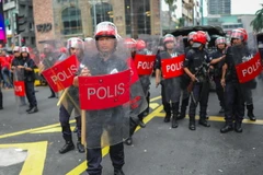 Cảnh sát chống bạo động được triển khai để đối phó với cuộc biểu tình ở Kuala Lumpur ngày 16/9/2015. Ảnh minh họa. (Nguồn: AFP/TTXVN)