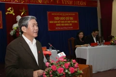 Thường trực Ban Bí thư Đinh Thế Huynh trả lời ý kiến cử tri tại phường Hải Châu 2. (Ảnh: Trần Lê Lâm/TTXVN)