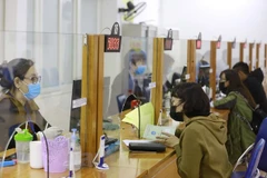 Số lượng lao động mất việc đăng ký hồ sơ hưởng trợ cấp thất nghiệp đang gia tăng. (Ảnh: Anh Tuấn/TTXVN)