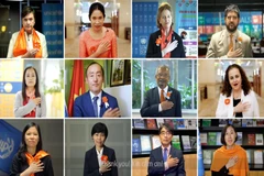 Lời cảm ơn được gửi đến các nhân viên tuyến đầu trong hỗ trợ phụ nữ và trẻ em là nạn nhân của bạo lực. (Ảnh: PV/Vietnam+)