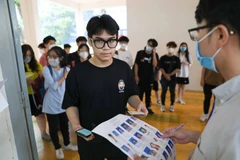 Thí sinh dự thi để xét tuyển vào các trường đại học. (Ảnh: TTXVN)