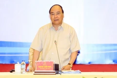 Thủ tướng Nguyễn Xuân Phúc phát biểu tại buổi đối thoại. (Ảnh: Thống Nhất/TTXVN)