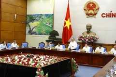 Thủ tướng Nguyễn Xuân Phúc, Chủ tịch Ủy ban Quốc gia về biến đổi khí hậu chủ trì cuộc họp lần thứ 8 về biến đổi khí hậu. (Ảnh: Thống Nhất/TTXVN)