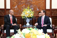 Chủ tịch nước Trần Đại Quang tiếp ông Herminio Lopez Diaz, Đại sứ Đặc mệnh toàn quyền Cộng hòa Cuba tại Việt Nam. (Ảnh: Nhan Sáng/TTXVN)