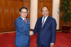 Thủ tướng Nguyễn Xuân Phúc tiếp Bộ trưởng Kinh tế, Thương mại và Công nghiệp Nhật Bản Seko Hiroshige. (Ảnh: Thống Nhất/TTXVN)