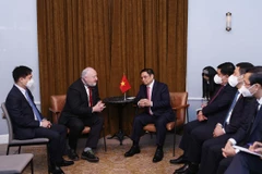 Thủ tướng Phạm Minh Chính tiếp Hiệu trưởng trường Đại học Liverpool và Đại học Hume. (Ảnh: Dương Giang/TTXVN)