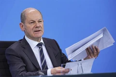 Ông Olaf Scholz phát biểu tại cuộc họp báo ở Berlin, Đức. (Ảnh: AFP/TTXVN)