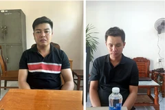 Đối tượng Võ Trần Hoàng (phải) và Ngô Phước Thịnh tại cơ quan điều tra. Ảnh: TTXVN phát