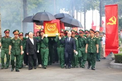 Lễ truy điệu hài cốt liệt sỹ. (Ảnh: Huyền Trang/TTXVN)