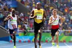 Usain Bolt (giữa) thi đấu ở nội dung chạy 200m nam. (Nguồn: EPA/TTXVN)