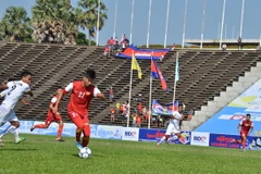 Trận đấu khai mạc giữa U22 Việt Nam và U22 Myanmar trong khuôn khổ giải bóng đá BIDC Cup 2013. (Ảnh: Trần Chí Hùng/Vietnam+)