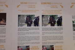 Loạt bài phóng sự điều tra “Nhức nhối nạn buôn bán ngà ở Tây Nguyên: Không xử lý nghiêm, voi sẽ tuyệt chủng” được trưng bày tại lễ trao giải. (Ảnh: PV/Vietnam+)