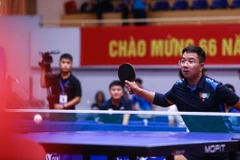 Một trong những trận đấu đầu tiên của Giải bóng bàn cúp Hội Nhà báo Việt Nam lần thứ XIV. (Ảnh: Hiển Nguyễn/Vietnam+) 