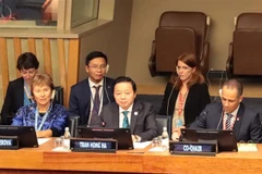 Phó Thủ tướng Chính phủ Trần Hồng Hà phát biểu tại Phiên đối thoại. (Ảnh: Quang Huy/TTXVN)